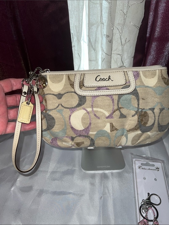 Coach Handbags - Coach Beige Signature Canvas Wristlet with Pastel Blue and Lavender Accents